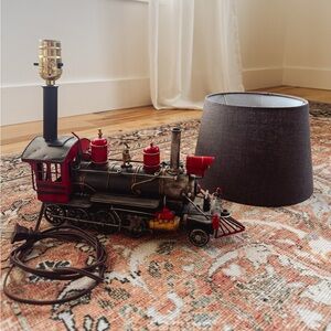 Listing for Kodi Dey - Vintage Train Table Lamp with Red and Black Accents